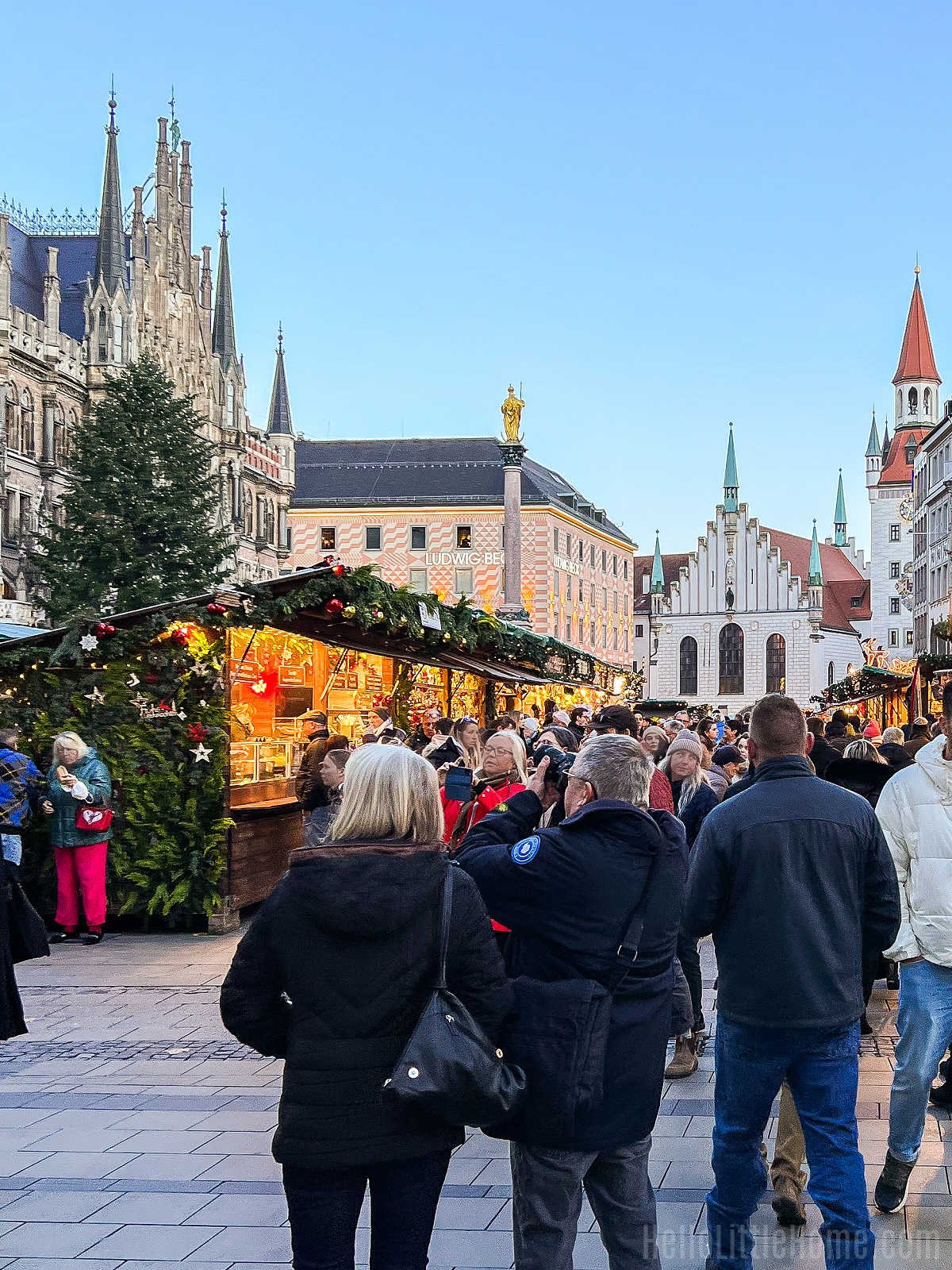 People walking around the Marienplatz Christmas Market in Munich.
