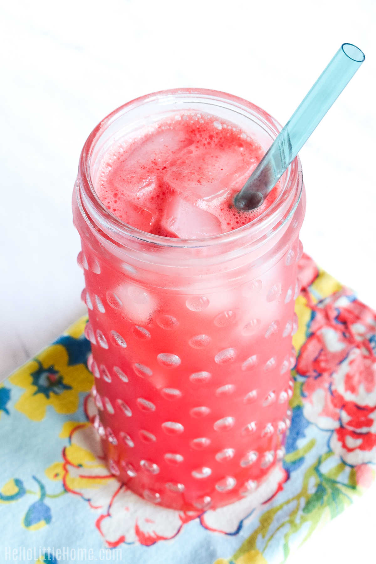 The finished fresca drink served on a patterned napkin.