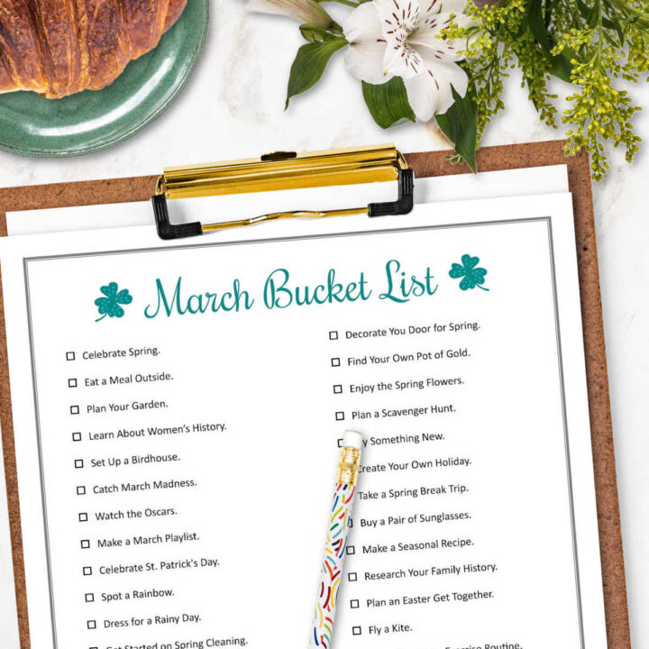 A copy of the March Bucket List attached to a clipboard.