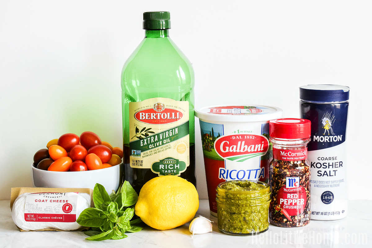 Ingredients for the Ricotta Toast recipe arranged together on a marble counter.