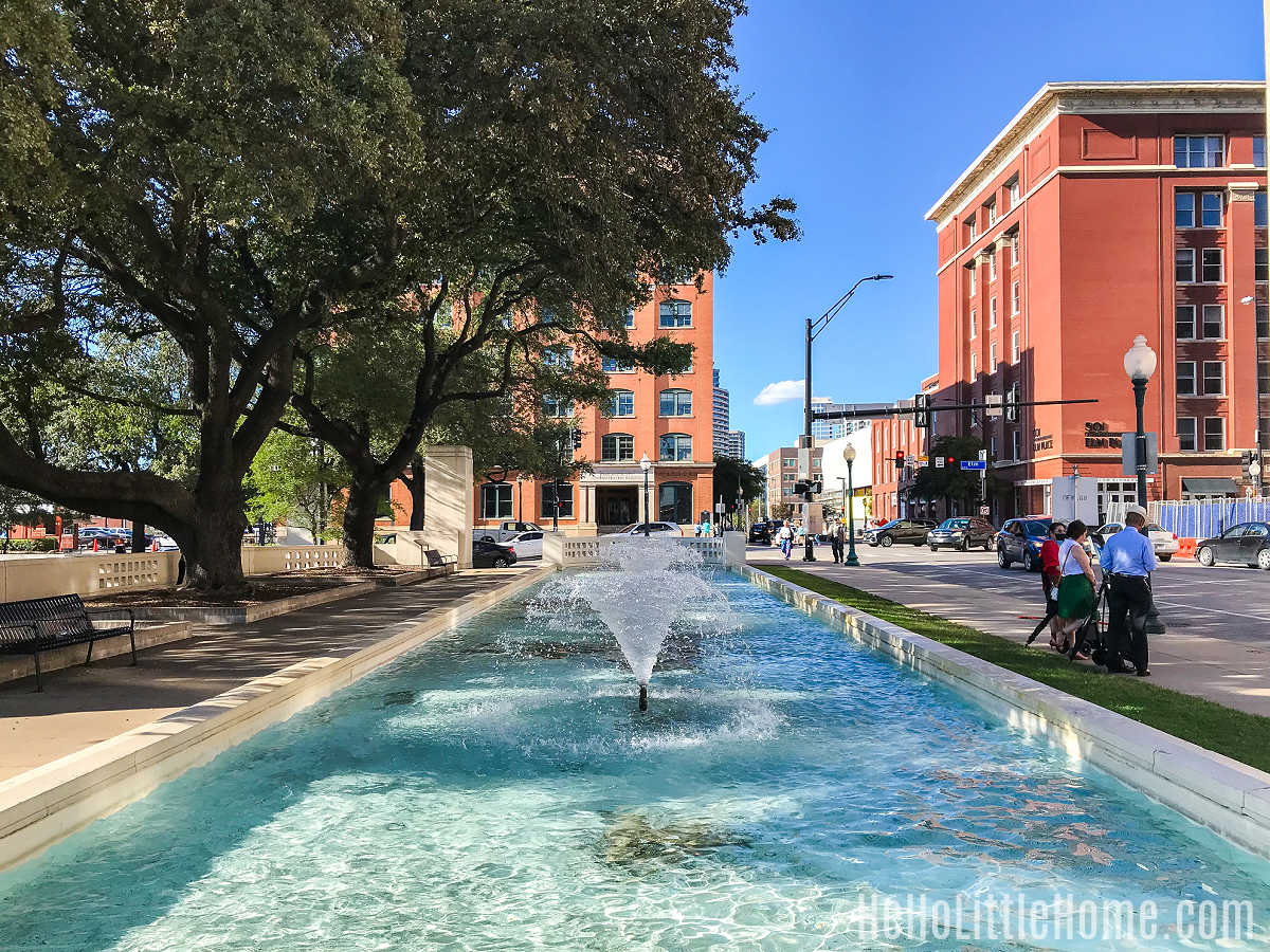A view of the Texas School Book Depository from the Dealey Plaza fountain.