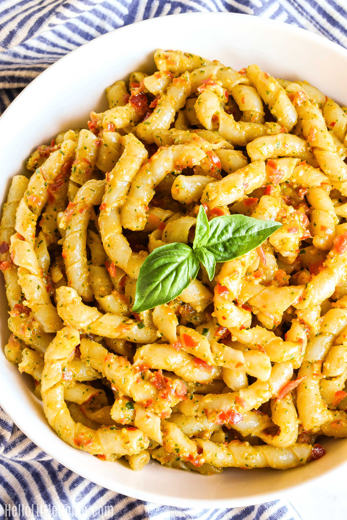 Closeup of the Busiate Siciliana served in a white bowl.