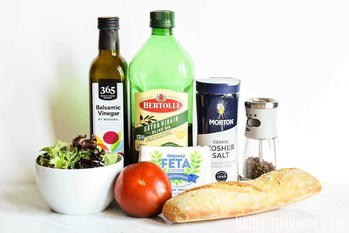 Feta Cheese Sandwich ingredients gathered together on a marble counter.