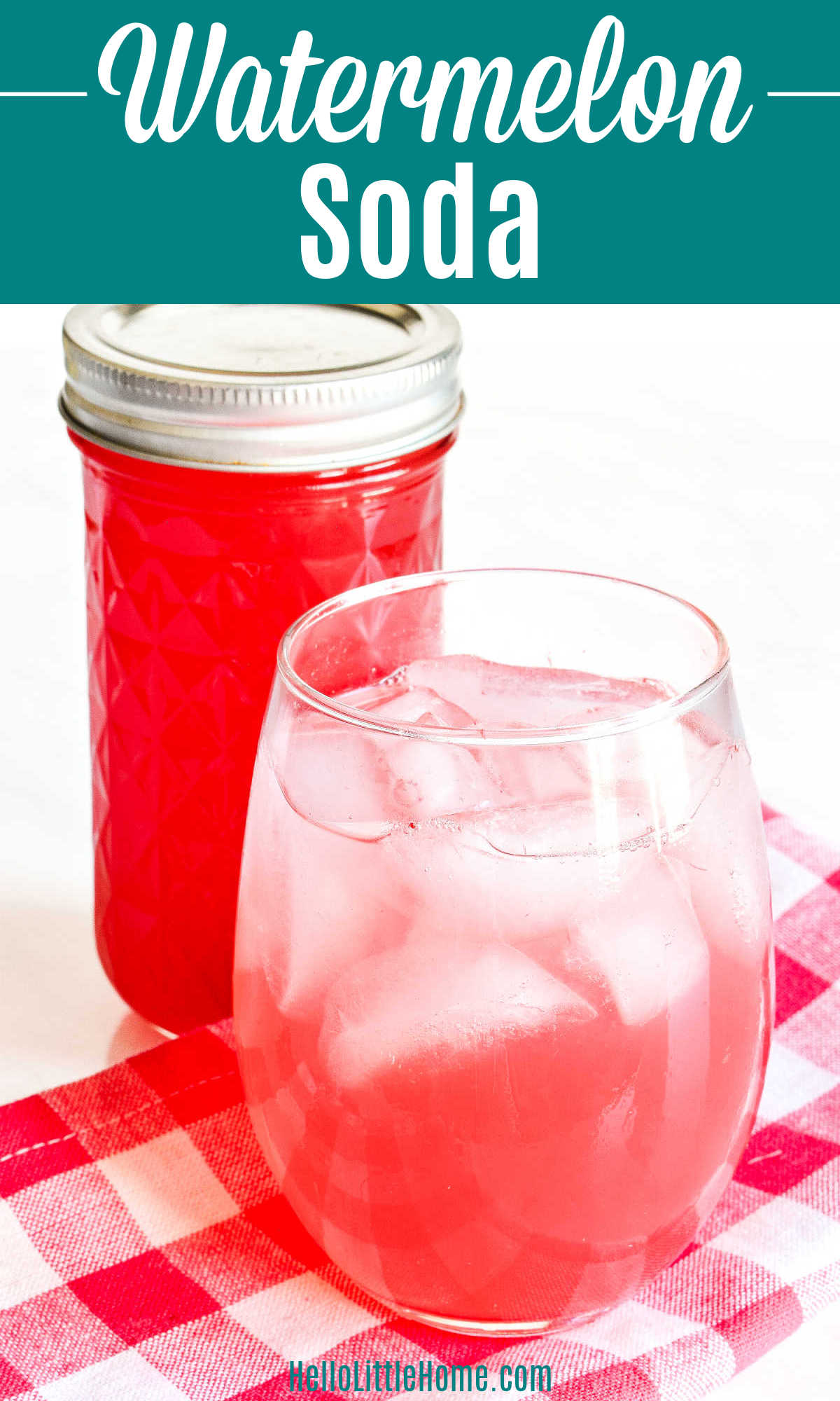 A glass of Watermelon Soda with a jar of watermelon syrup behind it.