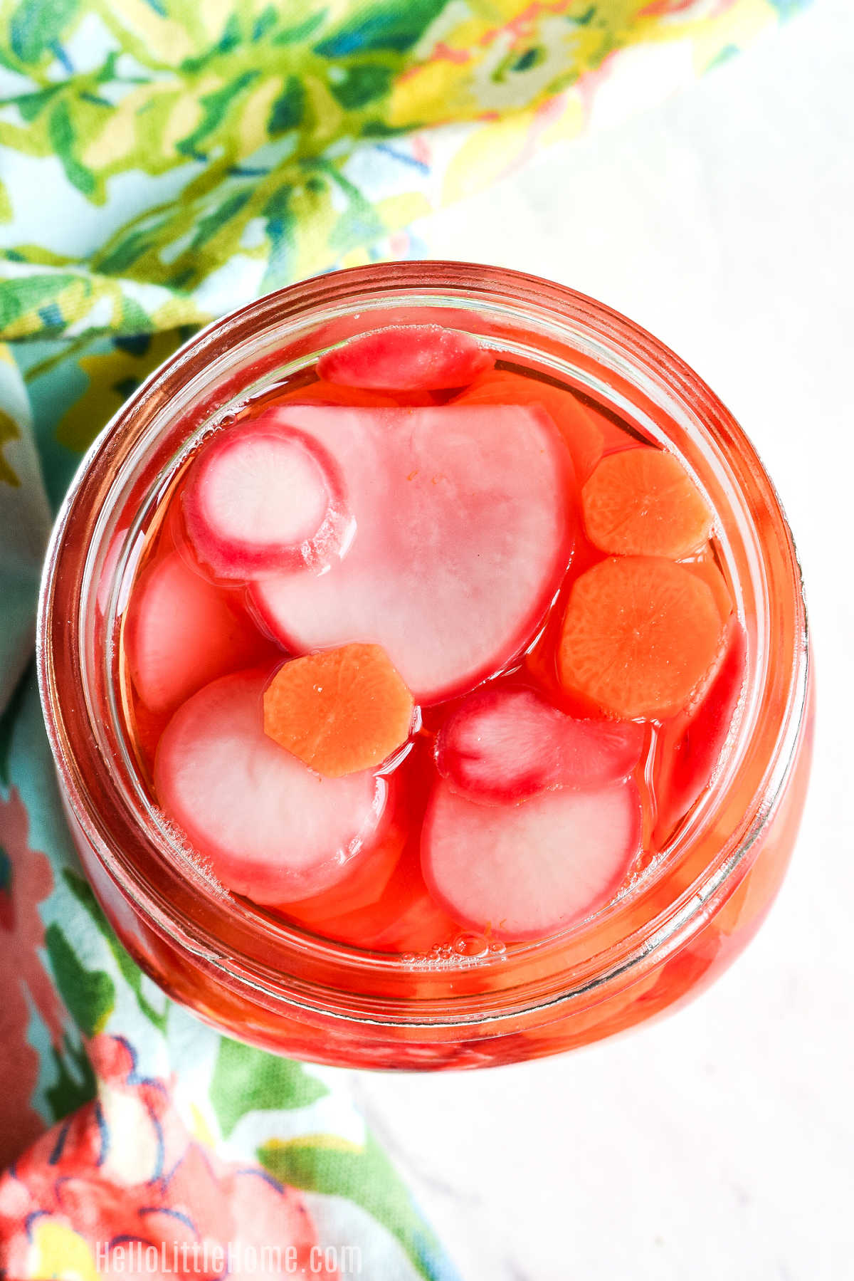 An overhead image of the homemade Pickled Radishes and Carrots.