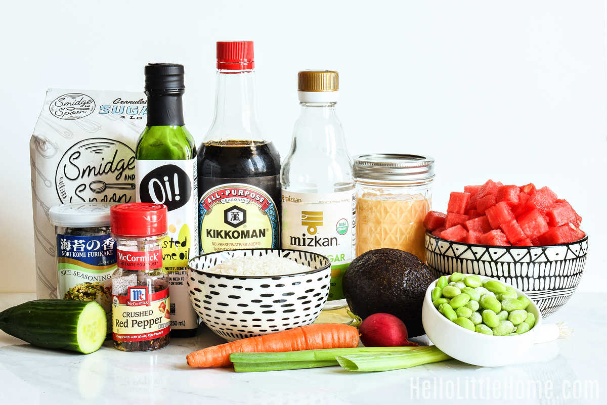 Watermelon Poke Bowl Ingredients gathered together on a marble counter.
