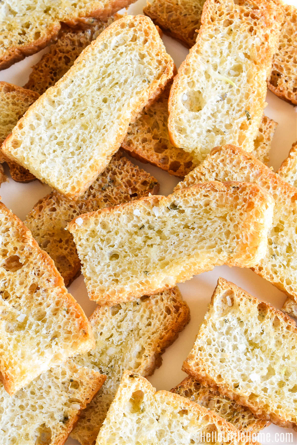 The finished focaccia bread appetizer served on a white tray.