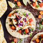 Butternut Squash Tacos served on a tray with a yellow napkin.