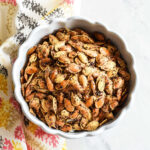 Cajun Pumpkin Seeds served in a bowl with a patterned napkin.